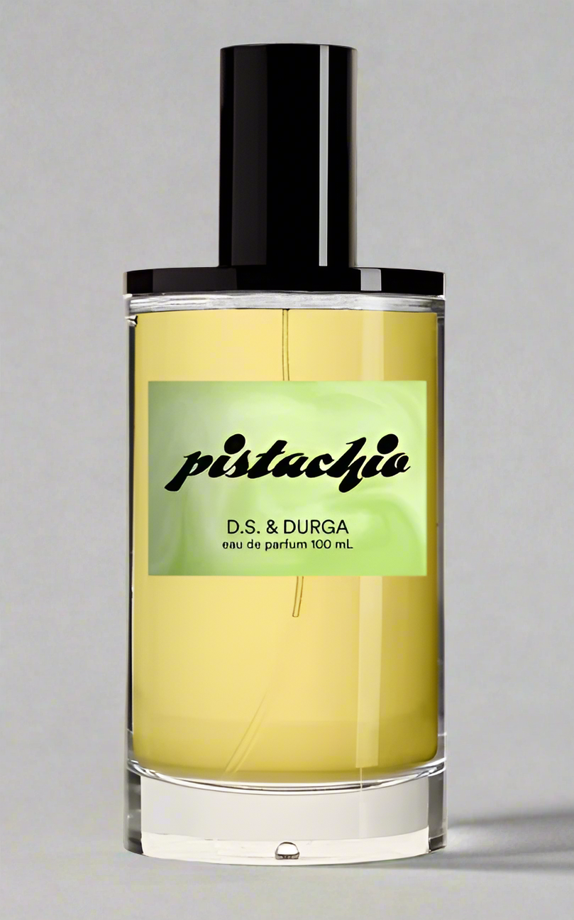 Durga Pistachio perfume bottle on luxury background